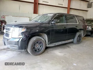 2019 Chevrolet Tahoe Commercial with VIN 1GNLCDEC4KR221203, listed as a Copart auction lot 66393195 with 128,145 mi miles and Clean title. Bid and sale history available at DreamBid. Image 1.