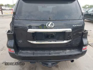 2014 Lexus GX with VIN JTJBM7FX0E5069997, listed as a IAAI auction lot 42076860 with 122,800 mi miles. Bid and sale history available at carsss.com. Image 6.