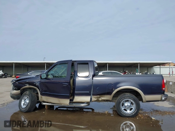 2000 Ford F-150 XL with VIN 1FTRX17L2YNB85627, listed as a IAAI auction lot 41377814 with 123,740 mi miles. Bid and sale history available at carsss.com. Image 15.
