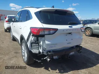 2022 Ford Escape Titanium with VIN 1FMCU9J93NUA99685, listed as a IAAI auction lot 41867437 with 36,987 mi miles and . Bid and sale history available at DreamBid. Image 3.