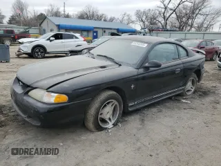 1997 Ford Mustang with VIN 1FALP4042VF198111, listed as a Copart auction lot 44245505 with 99,501 mi miles and Salvage Title. Bid and sale history available at carsss.com. Image 1.