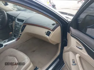2010 Cadillac CTS Luxury with VIN 1G6DE5EGXA0105266, listed as a IAAI auction lot 41376878 with 237,570 mi miles and . Bid and sale history available at carsss.com. Image 5.