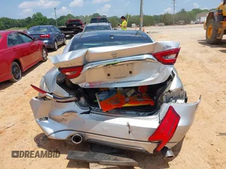 2016 Nissan Maxima SR with VIN 1N4AA6AP7GC389606, listed as a IAAI auction lot 42451614 with 114,957 mi miles and . Bid and sale history available at DreamBid. Image 16.