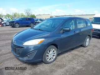 2012 Mazda 5 Sport with VIN JM1CW2BL4C0107491, listed as a IAAI auction lot 42191489 with 108,411 mi miles and . Bid and sale history available at DreamBid. Image 2.