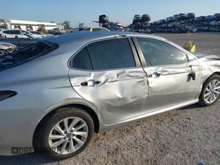 2023 Toyota Camry LE z VIN 4T1C11AK2PU125757, wystawiony jako IAAI lot #42128196 z przebiegiem 5 777 mil mil oraz . Historia ofert i sprzedaży dostępna na DreamBid. Obrazek 6.
