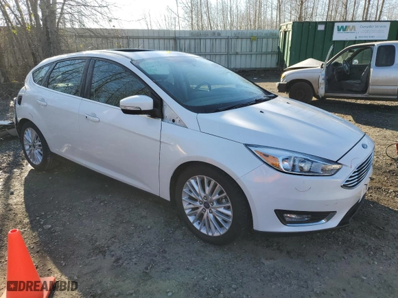 2015 Ford Focus Titanium with VIN 1FADP3N25FL325037, listed as a Copart auction lot 42248985 with 58,831 mi miles and Salvage Title. Bid and sale history available at carsss.com. Image 4.