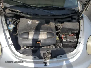 2003 Volkswagen Beetle GLS z VIN 3VWCK21Y33M326199, wystawiony jako Copart lot #54796685 z przebiegiem 142 574 mil mil oraz Szkoda całkowita • Salvage title. Historia ofert i sprzedaży dostępna na DreamBid. Obrazek 11.