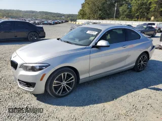 2020 BMW 2 Series 230i with VIN WBA2J1C06L7E79656, listed as a Copart auction lot 74909234 with 50,931 mi miles and Salvage Title. Bid and sale history available at carsss.com. Image 1.