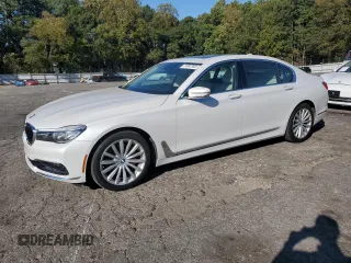 2016 BMW 7 Series 740i with VIN WBA7E2C54GG547970, listed as a Copart auction lot 71097393 with 60,464 mi miles. Bid and sale history available at carsss.com. Image 1.