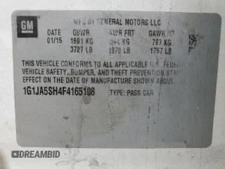 2015 Chevrolet Sonic LS with VIN 1G1JA5SH4F4165108, listed as a Copart auction lot 57299985 with 117,669 mi miles and Clean title. Bid and sale history available at DreamBid. Image 12.