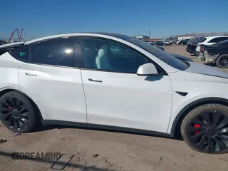 2023 Tesla Model Y Performance with VIN 7SAYGDEF1PF864976, listed as a IAAI auction lot 41667676 with Not Provided miles and . Bid and sale history available at DreamBid. Image 12.