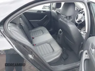 2014 Volkswagen Jetta SEL z VIN 3VWL17AJ3EM379295, wystawiony jako IAAI lot #41897734 z przebiegiem 124 344 mil mil oraz . Historia ofert i sprzedaży dostępna na DreamBid. Obrazek 8.