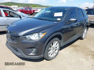 2014 Mazda CX-5 Grand Touring with VIN JM3KE2DY8E0383206, listed as a IAAI auction lot 40205756 with 120,231 mi miles. Bid and sale history available at carsss.com. Image 2.