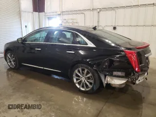 2014 Cadillac XTS Luxury with VIN 2G61N5S33E9246454, listed as a Copart auction lot 63100655 with 110,544 mi miles and Salvage title. Bid and sale history available at DreamBid. Image 2.