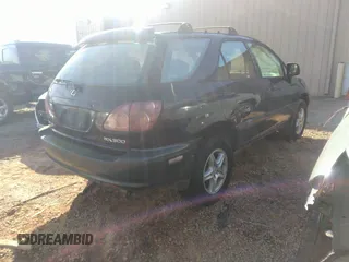 1999 Lexus RX 300 Luxury SUV with VIN JT6HF10U7X0038014, listed as a IAAI auction lot 41244208 with 183,823 mi miles. Bid and sale history available at carsss.com. Image 4.