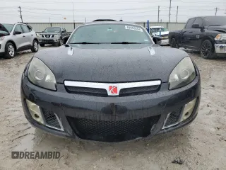 2009 Saturn Sky Red Line z VIN 1G8MG35X39Y106052, wystawiony jako Copart lot #69893854 z przebiegiem 124 937 mil mil oraz Szkody całkowita. Historia ofert i sprzedaży dostępna na DreamBid. Obrazek 5.