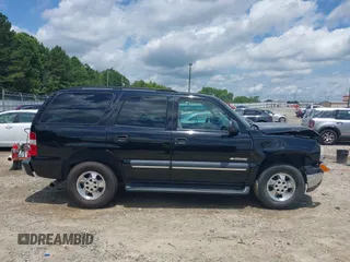2003 Chevrolet Tahoe LS with VIN 1GNEC13V03R315463, listed as a IAAI auction lot 42518427 with 155,629 mi miles and . Bid and sale history available at DreamBid. Image 14.