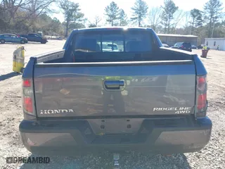2014 Honda Ridgeline RTL with VIN 5FPYK1F52EB002984, listed as a IAAI auction lot 41347361 with 162,015 mi miles. Bid and sale history available at carsss.com. Image 16.