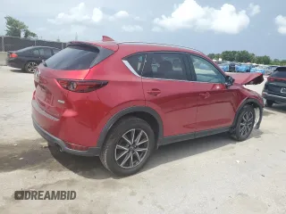2018 Mazda CX-5 Grand Touring with VIN JM3KFADM4J1395832, listed as a Copart auction lot 66464915 with 41,410 mi miles and Salvage title. Bid and sale history available at DreamBid. Image 3.