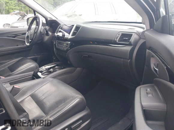 2017 Honda Pilot Touring with VIN 5FNYF5H99HB037126, listed as a IAAI auction lot 42275048 with 164,289 mi miles and . Bid and sale history available at DreamBid. Image 5.