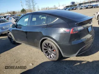 2021 Tesla Model Y Performance with VIN 5YJYGDEF9MF240125, listed as a Copart auction lot 88495425 with 45,829 mi miles and Salvage Title. Bid and sale history available at DreamBid. Image 2.