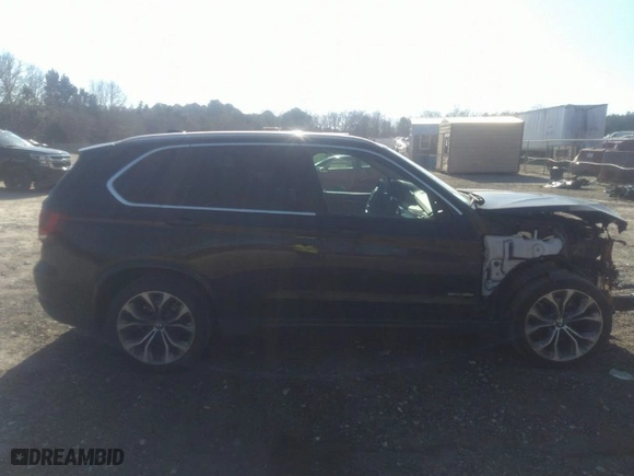 2015 BMW X5 sDrive35i with VIN 5UXKR2C58F0H35563, listed as a IAAI auction lot 41672472 with 106,525 mi miles. Bid and sale history available at carsss.com. Image 14.