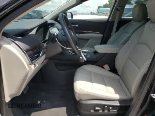 2023 Cadillac XT4 FWD Luxury с VIN 1GYAZAR47PF107473, выставлен на аукционе Copart как лот 59137665 с пробегом 9 198 миль миль и Списание • Salvage title. История ставок и продаж доступна на DreamBid. Изображение 7.
