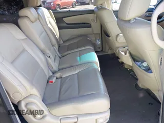 2012 Honda Odyssey EX-L with VIN 5FNRL5H63CB016526, listed as a IAAI auction lot 41701396 with 132,016 mi miles and . Bid and sale history available at carsss.com. Image 8.