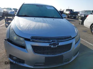 2014 Chevrolet Cruze 1LT z VIN 1G1PC5SBXE7102463, wystawiony jako IAAI lot #42625092 z przebiegiem 165 863 mil mil oraz . Historia ofert i sprzedaży dostępna na DreamBid. Obrazek 6.