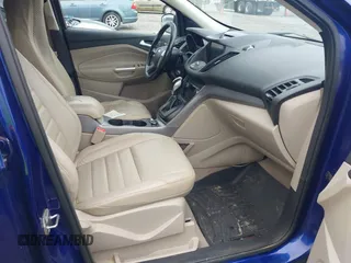 2016 Ford Escape SE z VIN 1FMCU9GX9GUB75094, wystawiony jako IAAI lot #42331270 z przebiegiem 162 288 mil mil oraz . Historia ofert i sprzedaży dostępna na DreamBid. Obrazek 5.