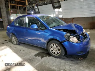 2013 Suzuki SX4 LE with VIN JS2YC5A36D6102850, listed as a Copart auction lot 82205134 with 70,776 mi miles and Salvage Title. Bid and sale history available at carsss.com. Image 4.
