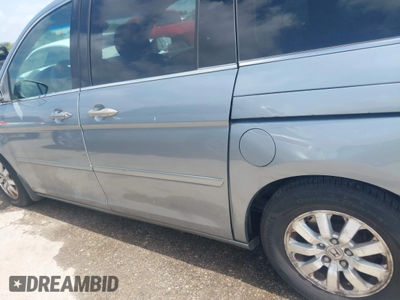 2010 Honda Odyssey EX with VIN 5FNRL3H42AB002679, listed as a IAAI auction lot 42692701 with 179,905 mi miles and . Bid and sale history available at DreamBid. Image 15.