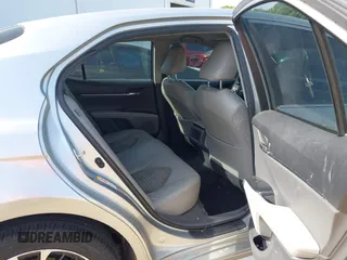 2018 Toyota Camry LE z VIN JTNB11HK7J3045966, wystawiony jako IAAI lot #42069246 z przebiegiem 138 960 mil mil oraz . Historia ofert i sprzedaży dostępna na DreamBid. Obrazek 8.
