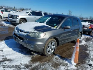 2007 Acura RDX with VIN 5J8TB18237A021790, listed as a IAAI auction lot 41604769 with 170,968 mi miles. Bid and sale history available at carsss.com. Image 2.
