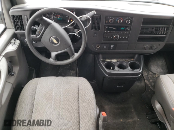 2013 Chevrolet Express Passenger 1LT с VIN 1GAZGYFG4D1190237, выставлен на аукционе Copart как лот 49204764 с пробегом 159 160 миль миль и Списание • Salvage title. История ставок и продаж доступна на DreamBid. Изображение 8.