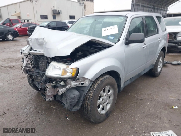 2011 Mazda Tribute Sport with VIN 4F2CY9C7XBKM01050, listed as a IAAI auction lot 41433870 with 122,287 mi miles. Bid and sale history available at carsss.com. Image 2.