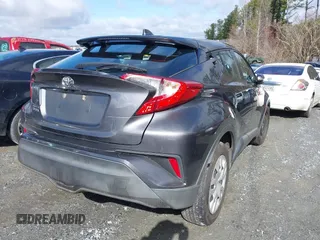 2021 Toyota C-HR LE with VIN NMTKHMBX9MR128998, listed as a IAAI auction lot 41575235 with 96,908 mi miles. Bid and sale history available at carsss.com. Image 4.