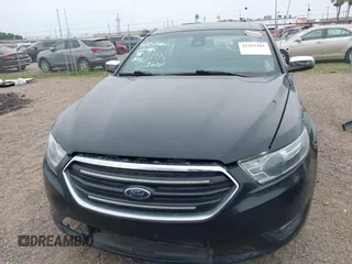 2017 Ford Taurus Limited z VIN 1FAHP2F80HG104374, wystawiony jako IAAI lot #42283261 z przebiegiem 169 378 mil mil oraz . Historia ofert i sprzedaży dostępna na DreamBid. Obrazek 13.