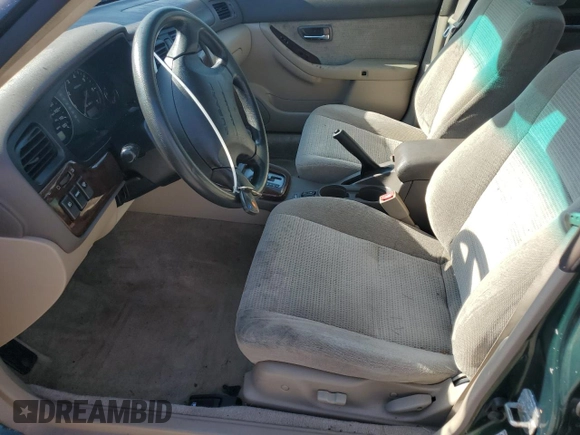 2003 Subaru Legacy Outback with VIN 4S3BH675937603532, listed as a Copart auction lot 64698175 with 198,647 mi miles and Clean title. Bid and sale history available at DreamBid. Image 7.