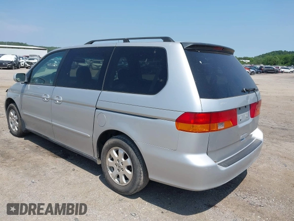 2003 Honda Odyssey EX-L z VIN 5FNRL18053B088851, wystawiony jako IAAI lot #42197114 z przebiegiem 219 456 mil mil oraz . Historia ofert i sprzedaży dostępna na DreamBid. Obrazek 3.
