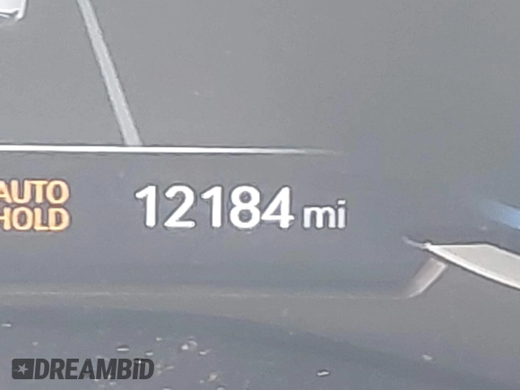 2023 Genesis G70 2.0T z VIN KMTG34TA5PU123377, wystawiony jako IAAI lot #41632566 z przebiegiem 12 184 mil mil oraz . Historia ofert i sprzedaży dostępna na DreamBid. Obrazek 15.