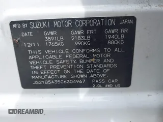 2012 Suzuki SX4 Crossover z VIN JS2YB5A35C6304967, wystawiony jako IAAI lot #42282088 z przebiegiem 152 232 mil mil oraz . Historia ofert i sprzedaży dostępna na DreamBid. Obrazek 9.