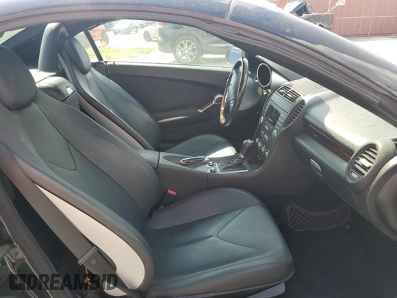 2007 Mercedes-Benz SLK-Class 3.0L with VIN WDBWK54F27F138919, listed as a Copart auction lot 72077514 with 64,519 mi miles and Salvage Title. Bid and sale history available at carsss.com. Image 10.