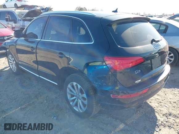 2014 Audi Q5 Premium with VIN WA1CFAFP4EA017515, listed as a IAAI auction lot 41000205 with 194,104 mi miles and . Bid and sale history available at DreamBid. Image 3.