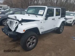 2017 Jeep Wrangler Unlimited 75th Anniversary z VIN 1C4BJWEG9HL684152, wystawiony jako IAAI lot #41880074 z przebiegiem 91 847 mil mil oraz . Historia ofert i sprzedaży dostępna na DreamBid. Obrazek 2.