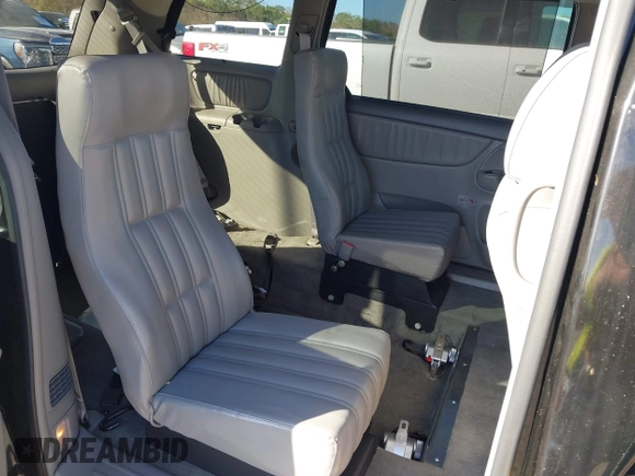 2009 Toyota Sienna XLE with VIN 5TDZK22C59S235573, listed as a IAAI auction lot 40885143 with 62,949 mi miles. Bid and sale history available at carsss.com. Image 8.