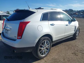 2013 Cadillac SRX Premium Collection with VIN 3GYFNJE32DS644094, listed as a IAAI auction lot 42513106 with 122,572 mi miles and . Bid and sale history available at DreamBid. Image 4.