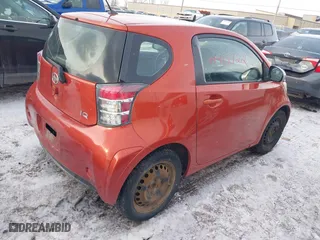 2012 Scion iQ with VIN JTNJJXB08CJ013774, listed as a IAAI auction lot 41418722 with 116,237 mi miles. Bid and sale history available at carsss.com. Image 4.
