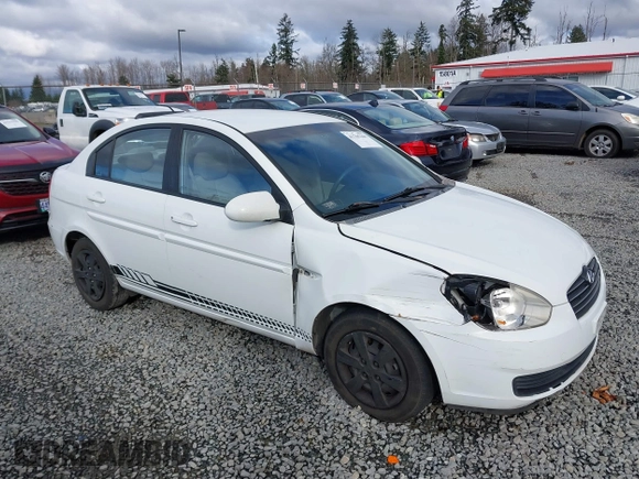 2006 Hyundai Accent GLS with VIN KMHCN46C36U009036, listed as a IAAI auction lot 41705369 with 134,328 mi miles. Bid and sale history available at carsss.com. Image 13.