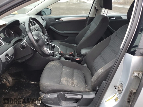 2013 Volkswagen Jetta SE z VIN 3VWBX7AJ5DM381039, wystawiony jako Copart lot #49706665 z przebiegiem 197 370 mil mil oraz Szkoda całkowita • Salvage title. Historia ofert i sprzedaży dostępna na DreamBid. Obrazek 7.